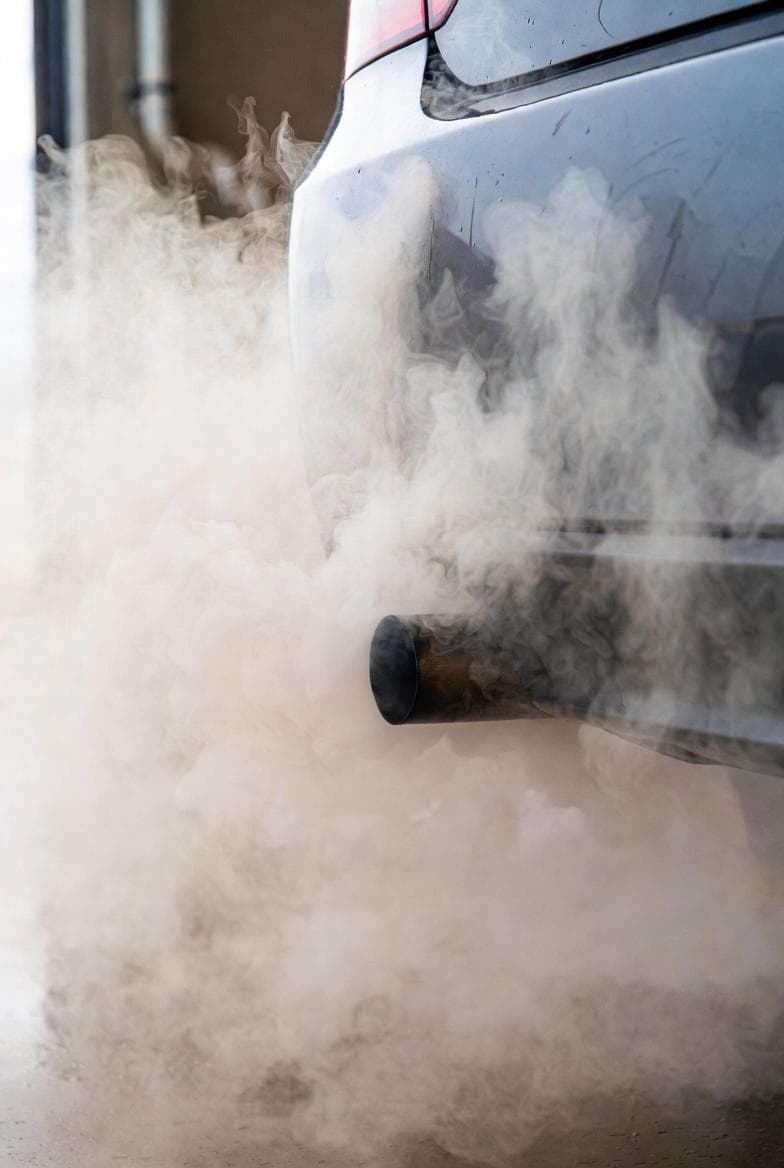 White Smoke From Car Exhaust? Causes & What It Means